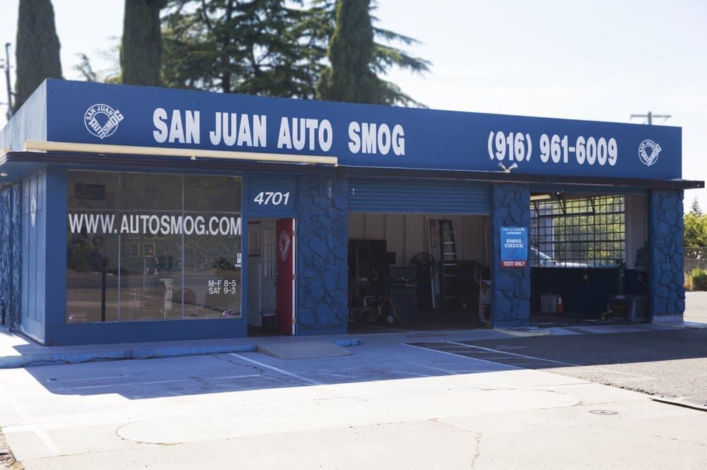 The San Juan Auto Smog shop front at 4701 San Juan Ave in Fair Oaks, with its service bays open