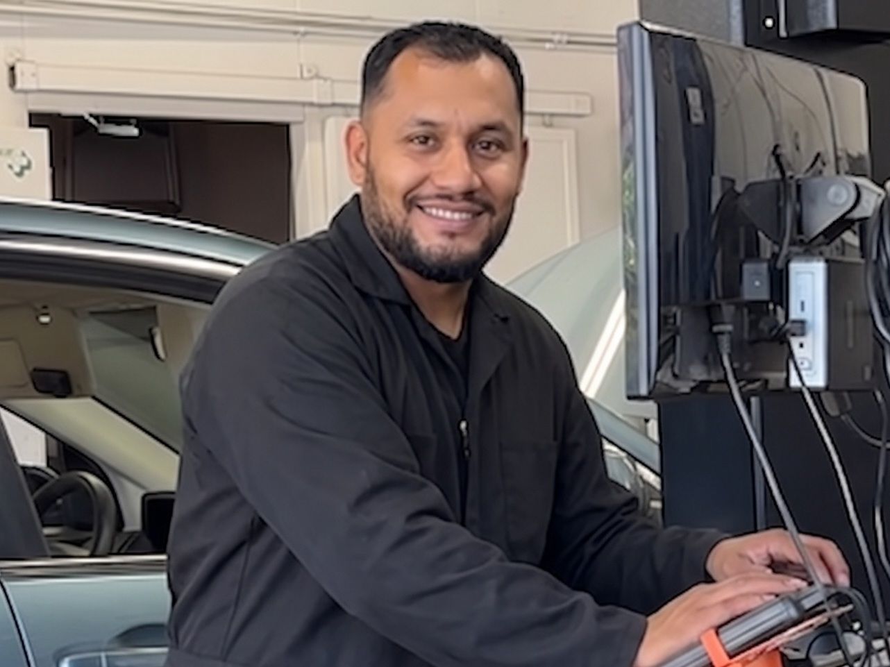 Smog technician working at San Juan Auto Smog in Fair Oaks